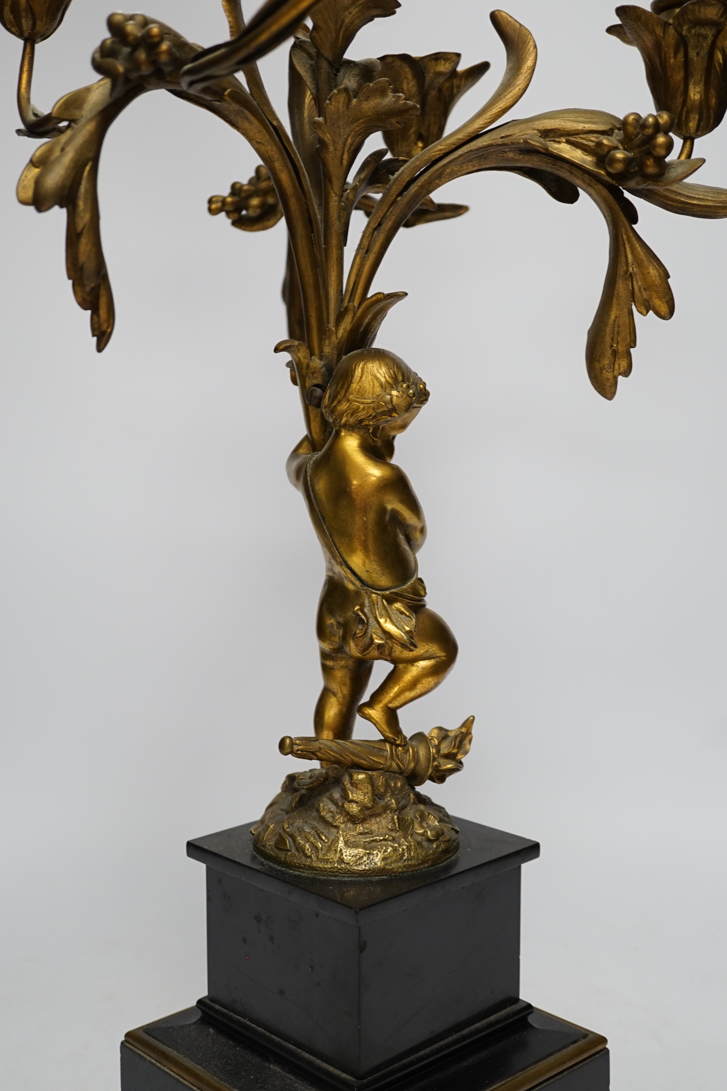 A 19th century ormolu and slate cherubic candelabrum, 58cm